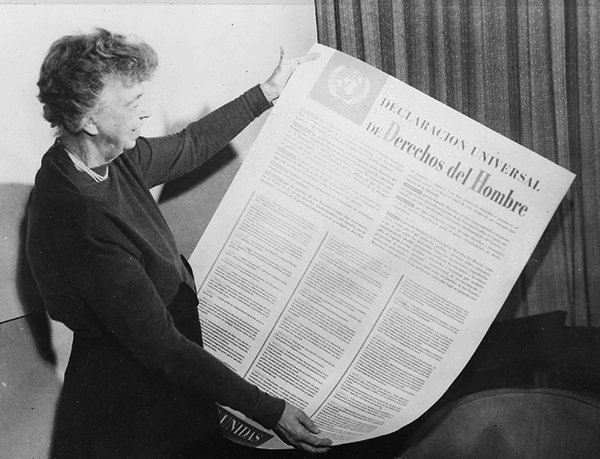 Eleanor Roosevelt holding Spanish version of the UN Universal Declaration of Human Rights, 1949