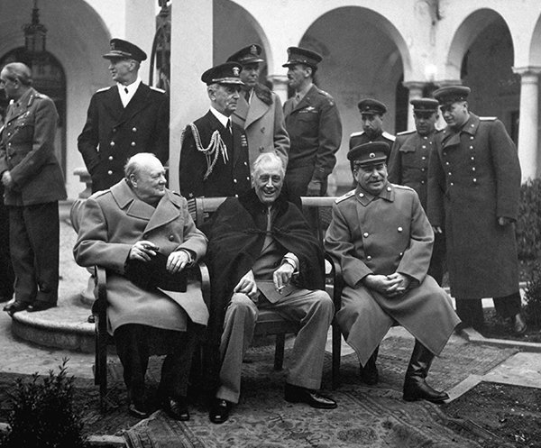 Prime Minister Winston S. Churchill, President Franklin D. Roosevelt, and Premier Josef Stalin meet at Yalta, 1945